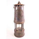 A miners lamp, in brass and other metals, type SL by Protector Lamp Lighting of Eccles,