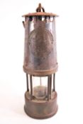 A miners lamp, in brass and other metals, type SL by Protector Lamp Lighting of Eccles,