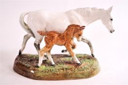 A Doulton horse group of a dapple grey mare and foal,