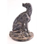 A cast iron door porter, in the form of a seated dog,