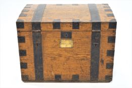 An iron bound oak silver chest of large proportions, set with two trays for 36 settings,