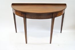 A 19th century mahogany demi-lune side table,
