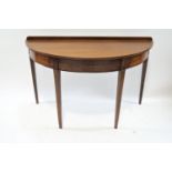 A 19th century mahogany demi-lune side table,