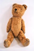 A 1950's plush Teddy Bear with articulated limbs,