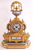 A 19th century French gilt metal and Sevres style porcelain panel mantel clock,