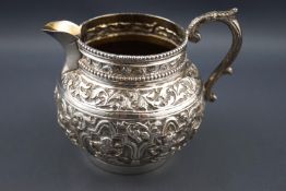 A 19th century Northern Indian white metal repousse,