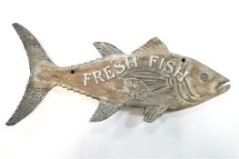 A carved wood and painted double sided shop sign in the form of a fish, inscribed "Fresh Fish,