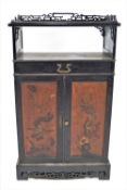 A 19th century Japanese lacquered cabinet, of plain rectangular form,