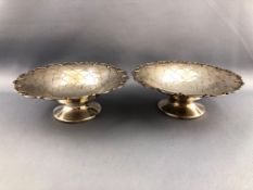 A pair of silver Mappin & Webb sweetmeat/bon bon dishes of round floral form