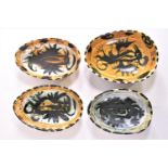 Four pieces of Newlyn Celtic pottery Folksy ware, comprising four oval/ovoid bowls,