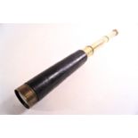 A mahogany and brass three pull telescope signed by G Adams, London, 57cm long,