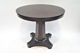 A William IV mahogany round centre table, on tapering octagonal pedestal,