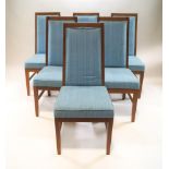 A set of twelve teak framed dining chairs, with blue upholstered backs and seats,