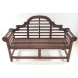 A pair of teak 'Lutyens' style garden benches, 106cm high,