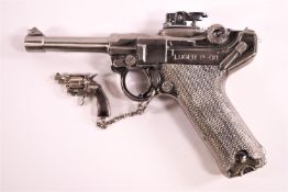 A cast metal replica Luger cigarette lighter,