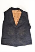 A gentleman's 19th century black embroidered waistcoat in silk