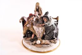 A Capodimonte figure group, 'Chiromante', by Roberto Braubilla,