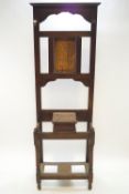 An early 20th century oak hall stand,