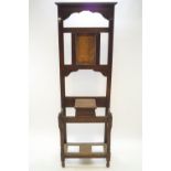 An early 20th century oak hall stand,