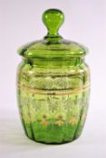 A 19th century green clear glass biscuit barrel with gilt and enamel decoration,