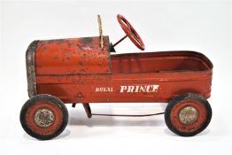 A child's tin toy red finished pedal car, the 'Royal Prince', by Triang,