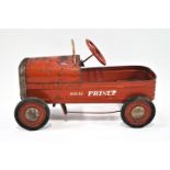 A child's tin toy red finished pedal car, the 'Royal Prince', by Triang,