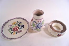 A Poole Pottery floral decorated posy ring, 15cm diameter,