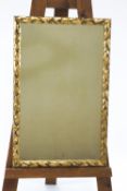 A rectangular gilt framed wall mirror,