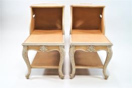 A pair of French style bedside staggered two tier bedside tables of unusual form,