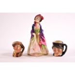 A Royal Doulton figure 'The Paisley Shawl' and two miniature character jugs,