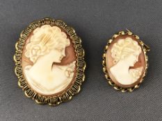 A yellow metal cameo brooch with rope design and fitted safety chain and brooch fittings,