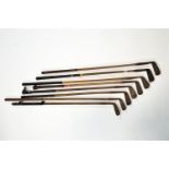 Six hickory shafted golf clubs,