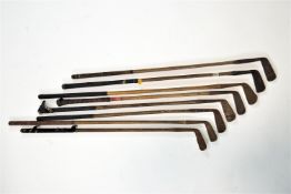 Six hickory shafted golf clubs,