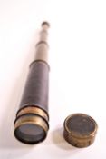A leather cased thee pull brass telescope,