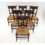 A set of six French fruitwood Art Deco chairs with curved backs,