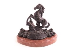 A cast metal desk stand in the form of a rearing horse with two pen holders (?), signed Mene,