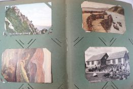 Three post card photograph albums containing a selection of United Kingdom and Continental views