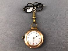 A yellow metal open face fob watch. Mechanical movement. Case reference: 126072.