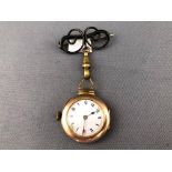 A yellow metal open face fob watch. Mechanical movement. Case reference: 126072.