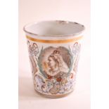 An 1897 enamel tin beaker, polychrome transfer decorated with a scene of Windsor Castle,