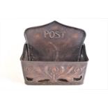 A copper post box,