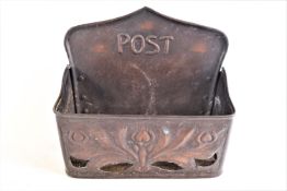 A copper post box,