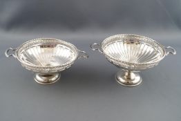 Two pairs of silver bon bon dishes,