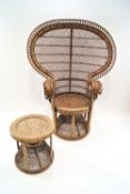 A caned fan back chair and matched footstool, 148cm high, footstool 46.5cm high
