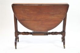 A Victorian mahogany Sutherland table with double turned supports linked by stretchers,