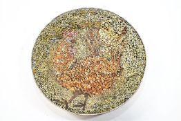 A metal wall plate inset with an eggshell micro-mosaic in the form of a chicken 48 cm