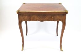 A French 18th century style Kingwood and Brass games table,