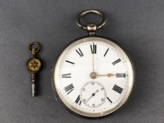 A white metal open face pocket watch. Case reference: 44659.