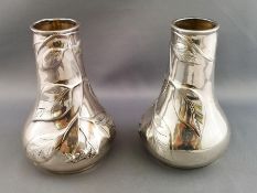 A pair of Tiffany & Co "Sterling Silver" vases, a Tiffany & Co silver two piece cruet,