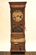 A National Time Recorder Co clock in oak case, circa 1900,